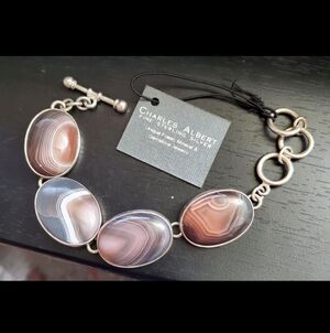 99.9% Sterling Charles Albert agate bracelet! Weighs a substantial 47.8 grams. H